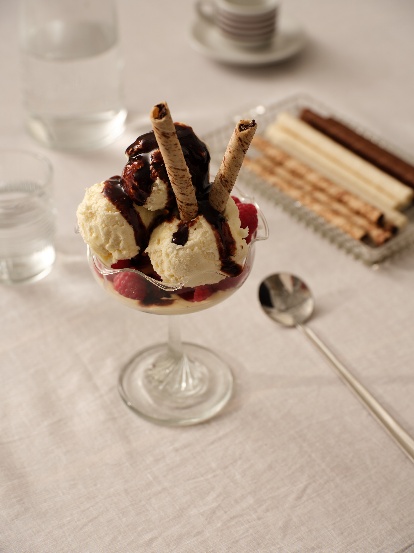 Ice cream sundae with wafer sticks